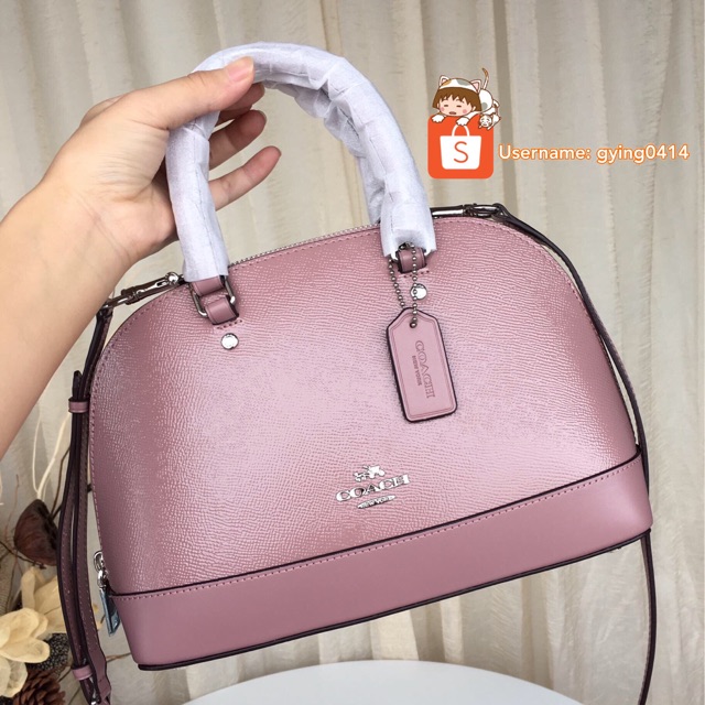 coach pink sling bag