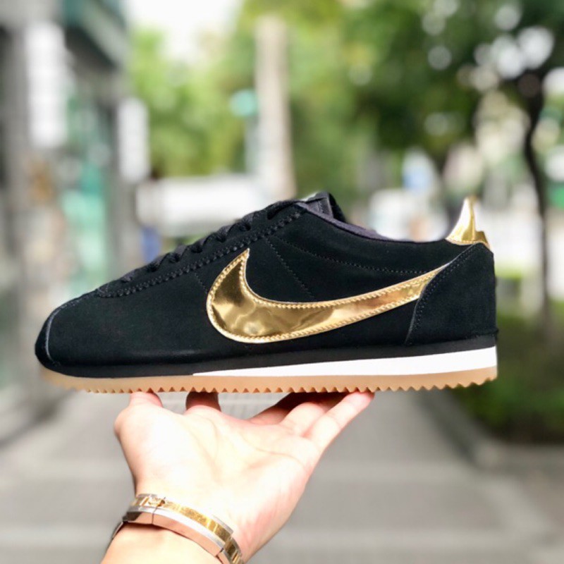 nike black gold cortez