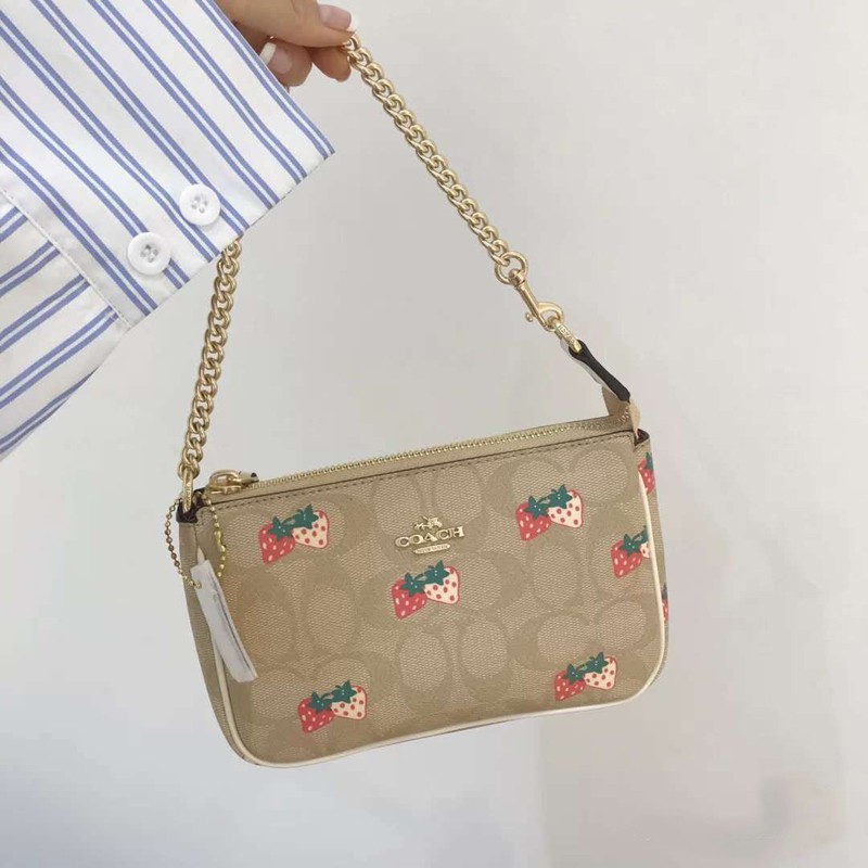 strawberry coach purse