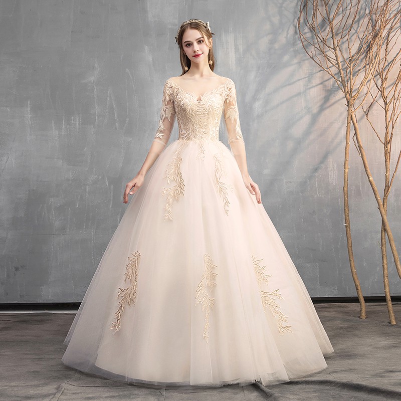 cream long sleeve wedding dress