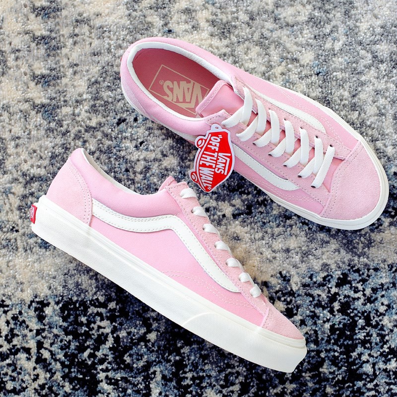 pink vans on feet