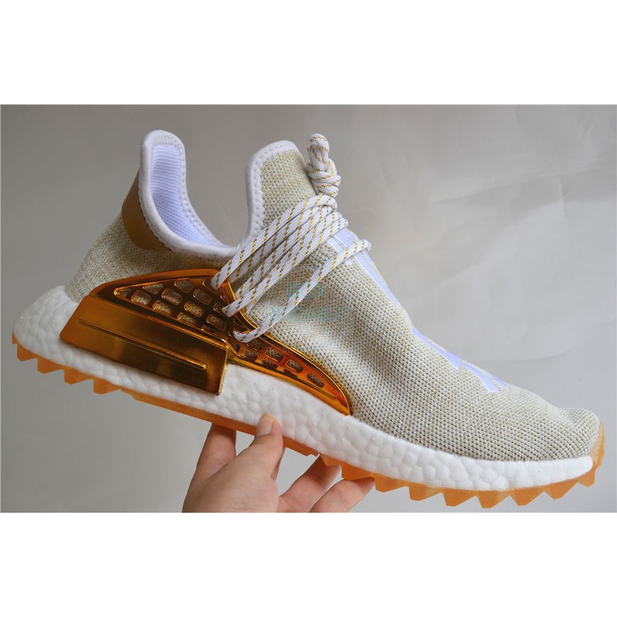 adidas human race dorados