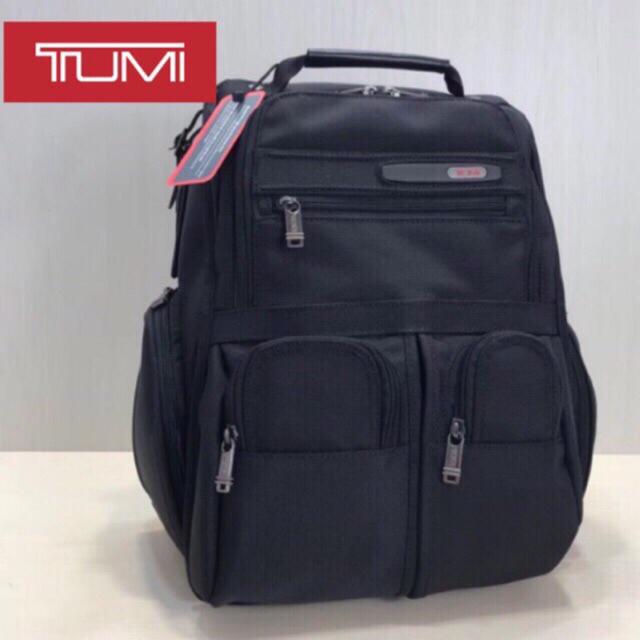 tumi compact nylon laptop brief pack