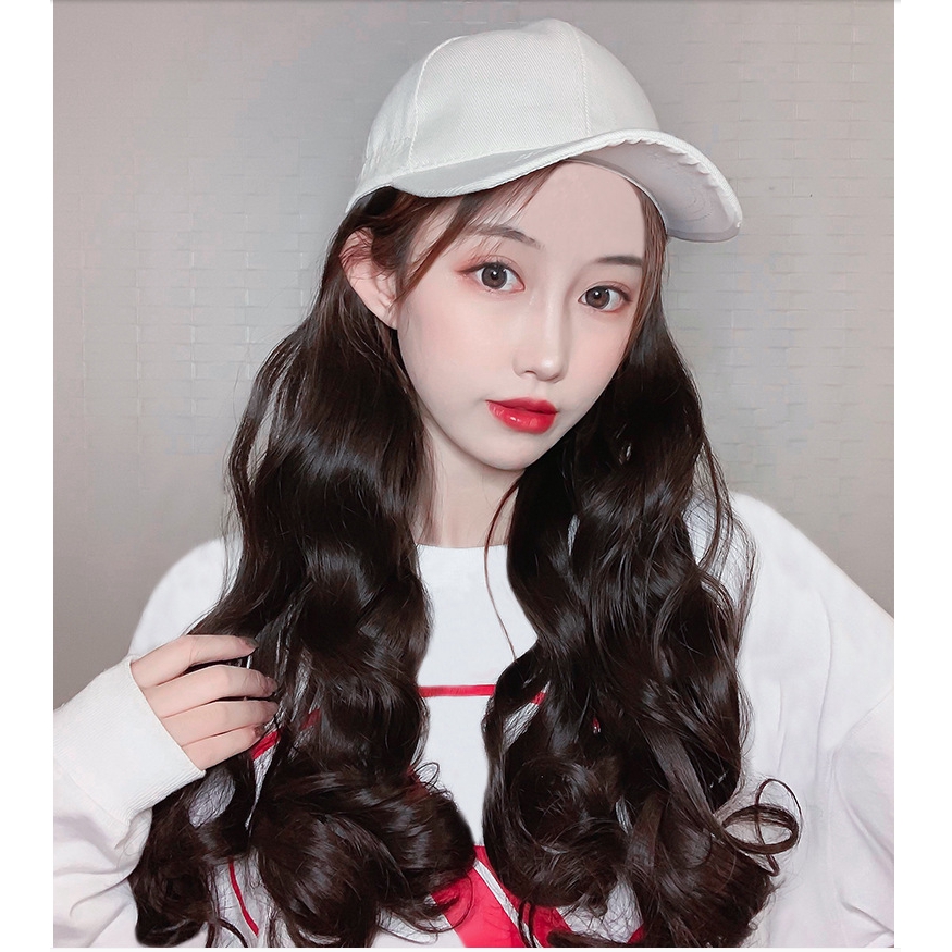 curly hair with baseball cap