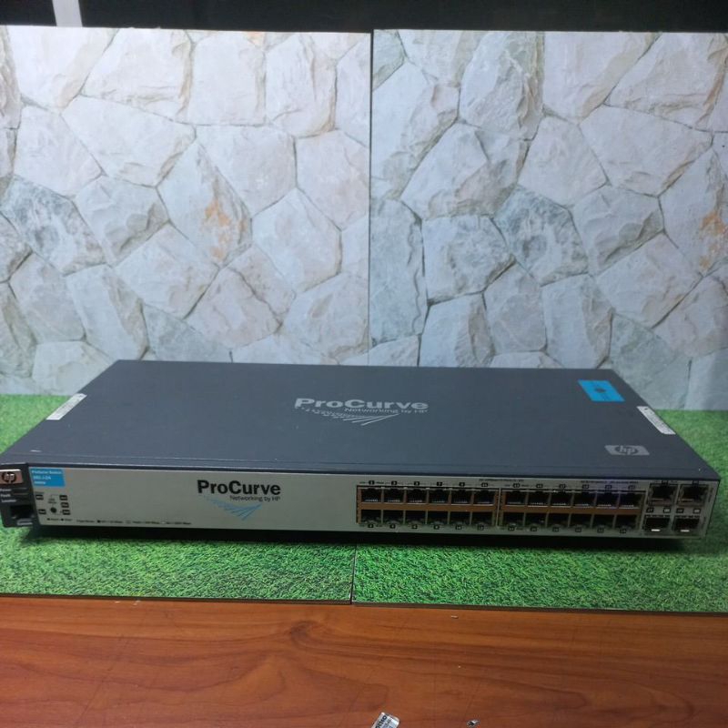 Switch gigabit Hp Procurve 261-j-24 j9085A 24 pprt 10/100+2 port gigabit