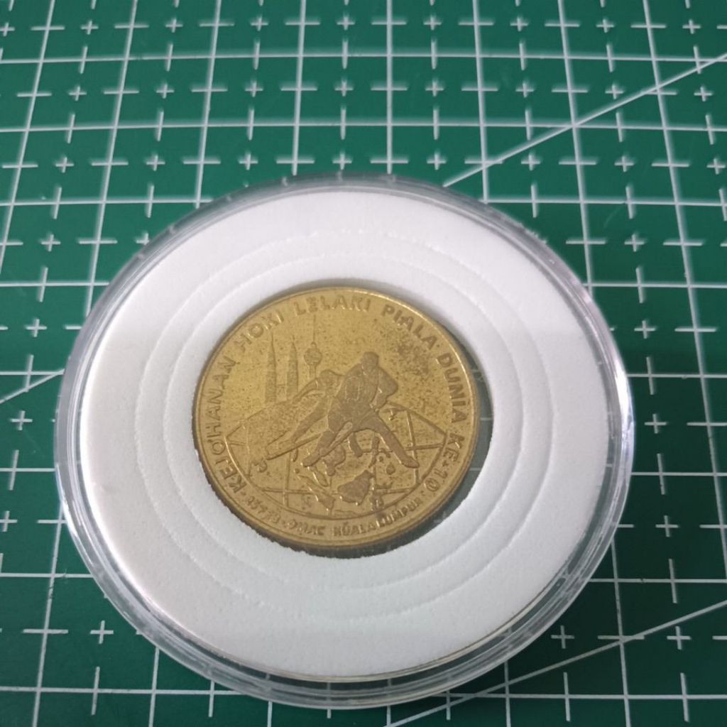 Duit Syiling RM1 Kejohanan Hoki Lelaki Piala Dunia Ke 10.