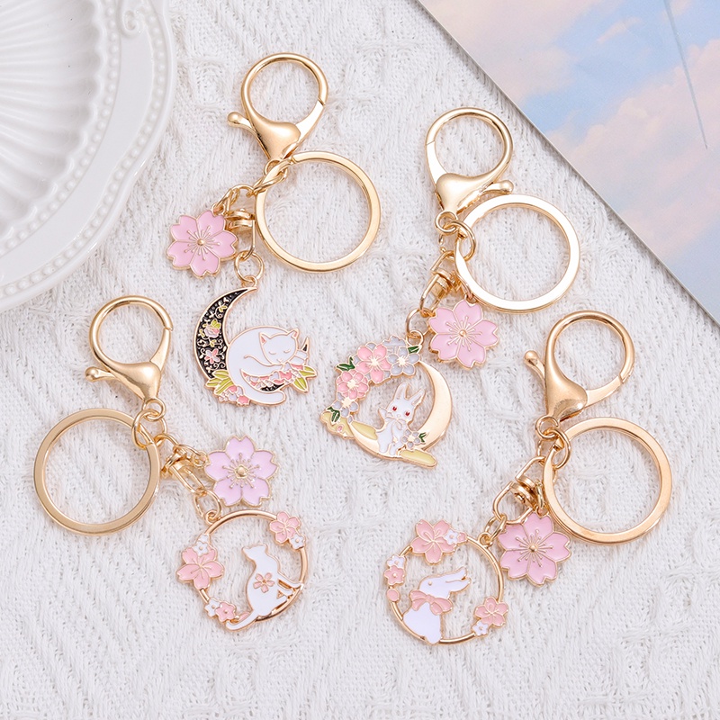 Cute Sakura Rabbit Garland Metal Keychain Pink Cat Female Pendant Airpods Headphone Protective Case Pendant Bag Hanging Chain Creative Gift for Friends