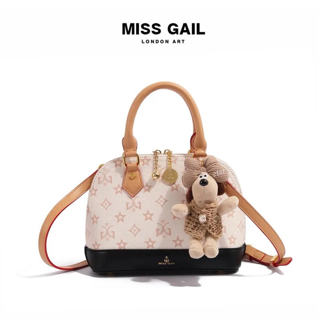 Mg1449-2. Miss GAIL women's handbag, Hong Kong brand, with luxurious domed zipper design. Dfull box Bag