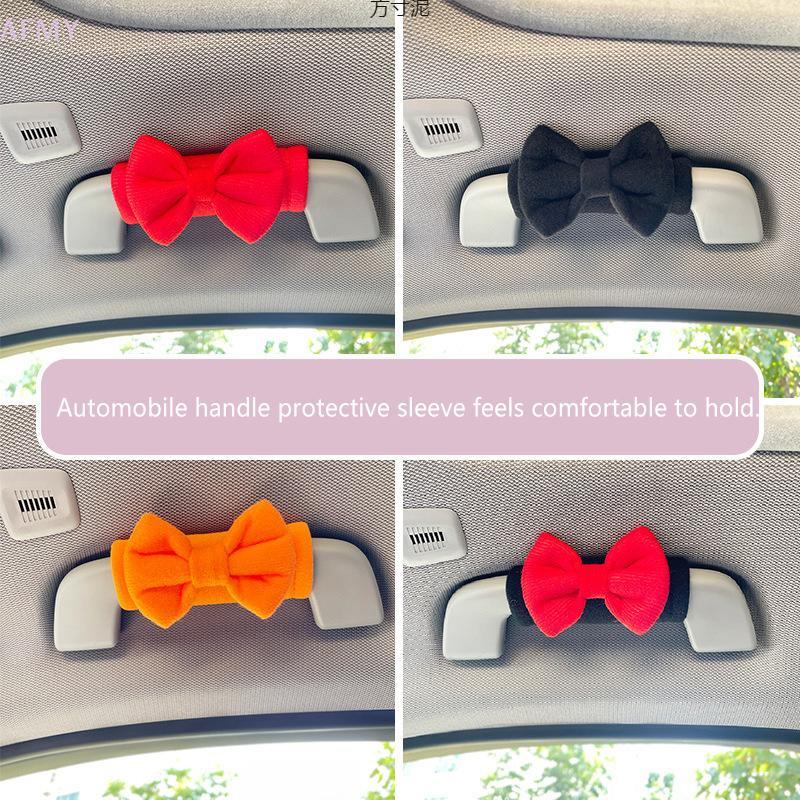 AFMY 1PC Car Roof Armrest Covers Soft Suede Protective Cover Car Roof Handle Cover Auto Interior Cute Bow Tie Accessories HOT
