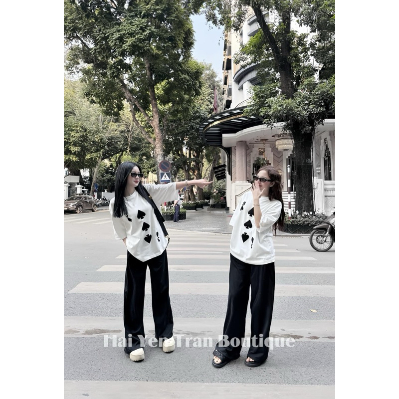 Women's set of loose white 3-piece shirt mixed with black long straight pants hottrend 2024