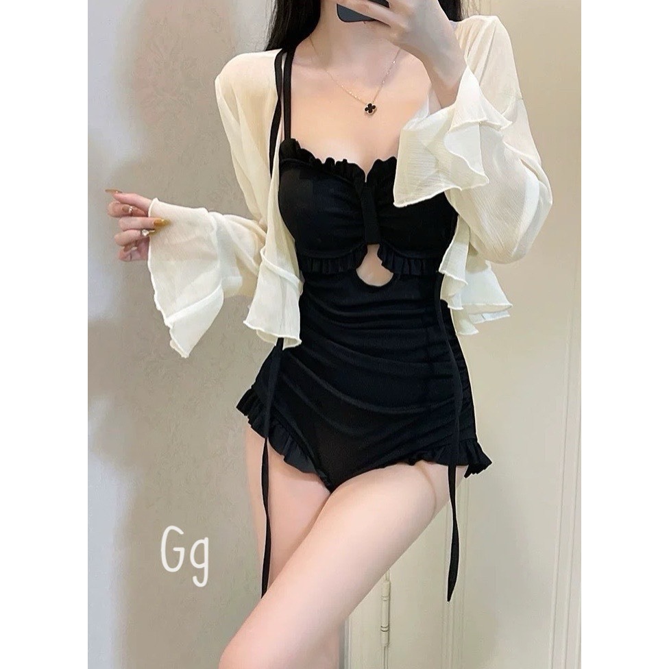 Jump camisole with open back and straps with a very hot outerJacket