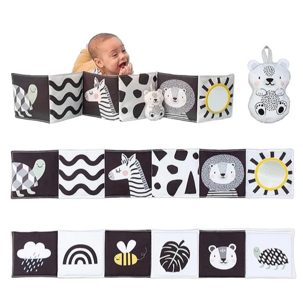 Savannah Taf Toys themed black and white cloth book supports baby's sensory and brain development